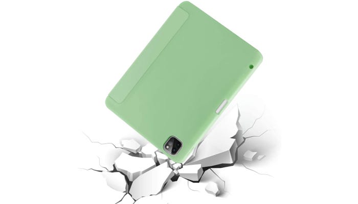 a light green iPad case on an iPad shown hitting broken ground but staying intact