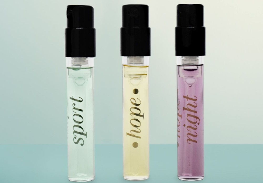 Three sample bottles of Hope, Hope Sport, and Hope Night perfumes.