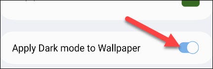 Toggle on "Apply Dark Mode to Wallpaper."