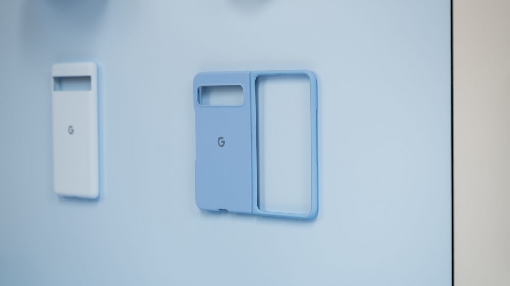 Blue Google Pixel Fold case mounted on a wall